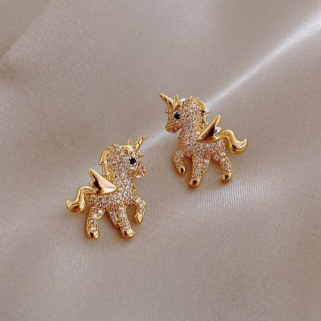 Süsse goldene Einhorn-Ohrringe mit Zirkonia