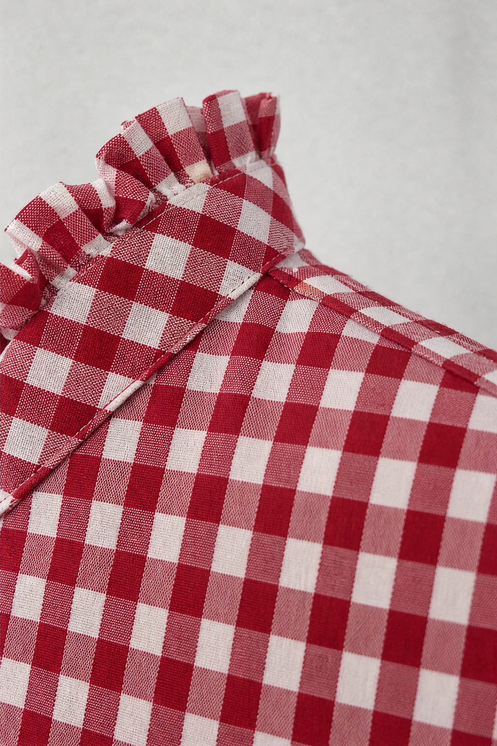 Bluse mit Rüschenkragen und Karomuster