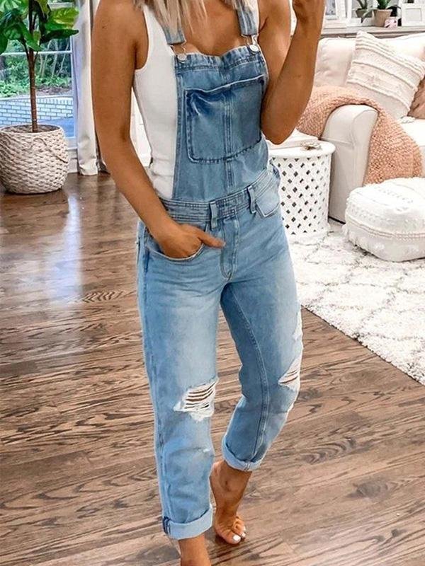 Locker geschnittene Damen-Jeanslatzhose mit Rissen