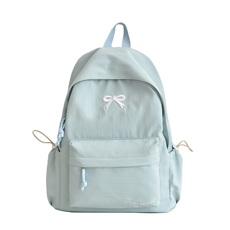 Lässige Schultasche mit Schleifenmuster