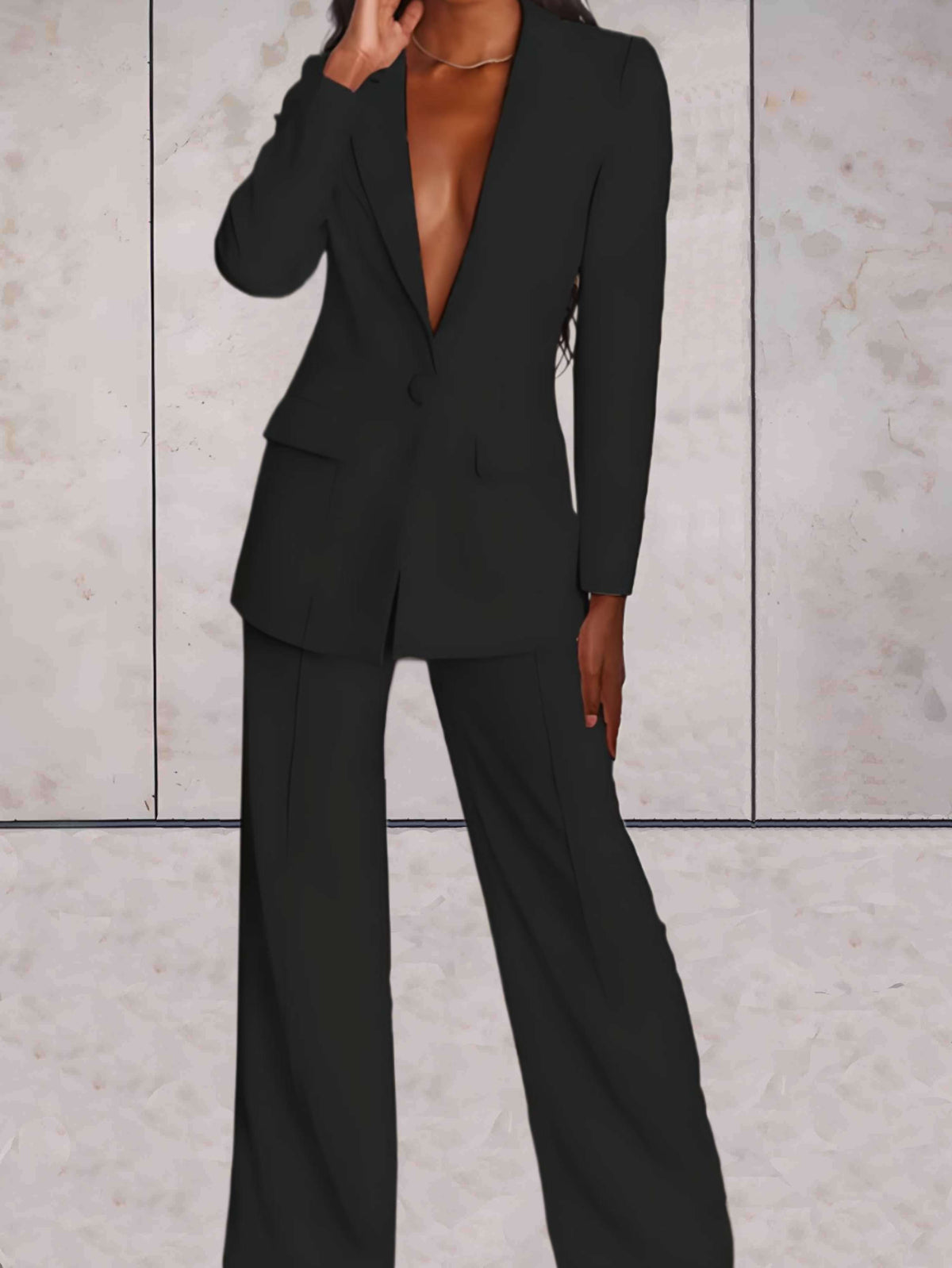 Damen-Zweiteiler mit elegantem Blazer und Hose mit weitem Bein