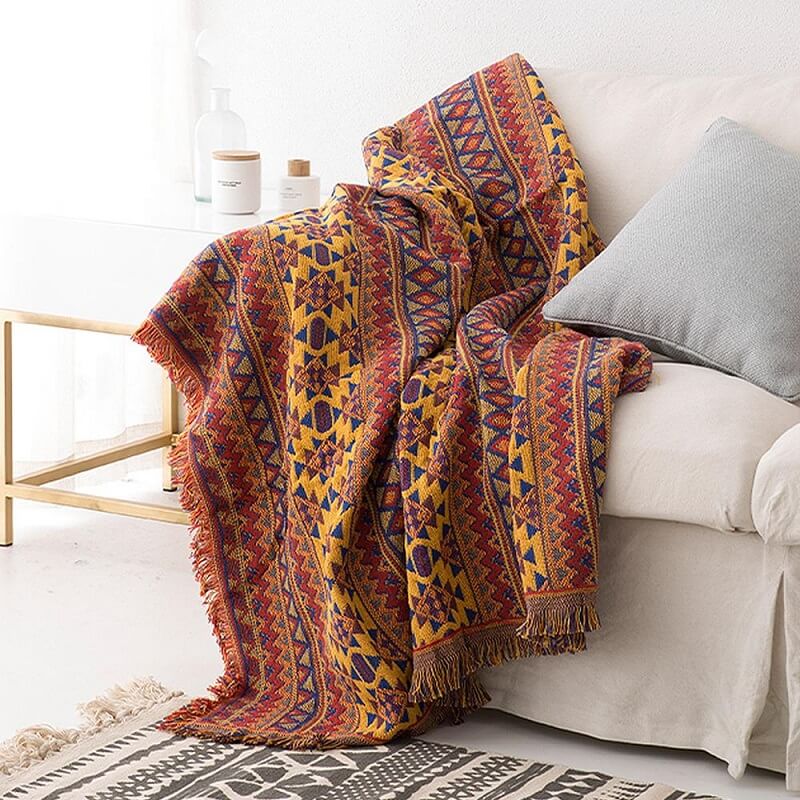 Gestrickte Boho-Sofadecke mit Fransen