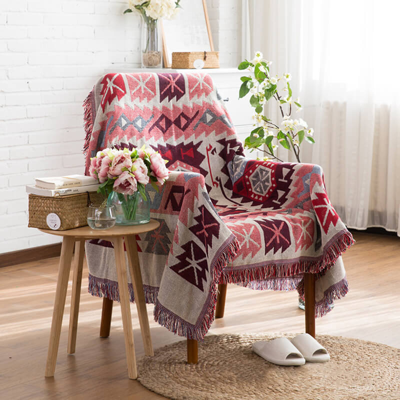 Gestrickte Boho-Sofadecke mit Fransen