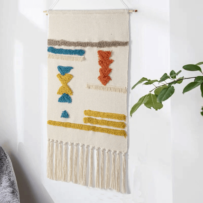Boho geometrische Wanddekoration mit Fransen