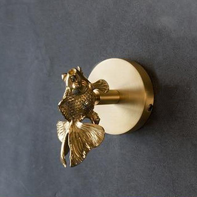 Dekorativer Kleiderhaken aus Messing mit Tierfigur und Goldbeschichtung