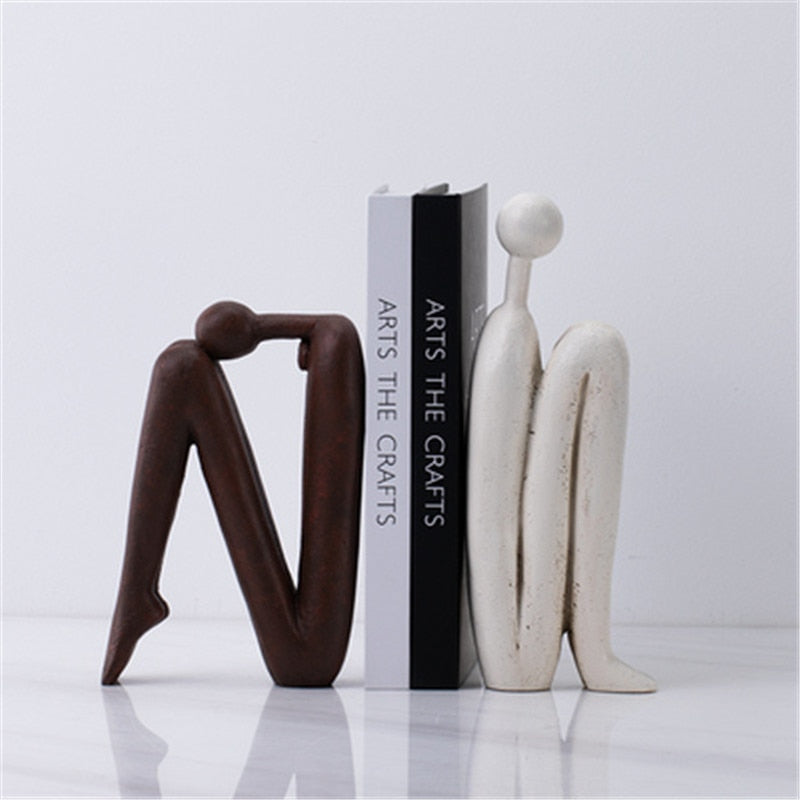 Dekorative Skulptur und Buchstütze – Moderne Regaldeko