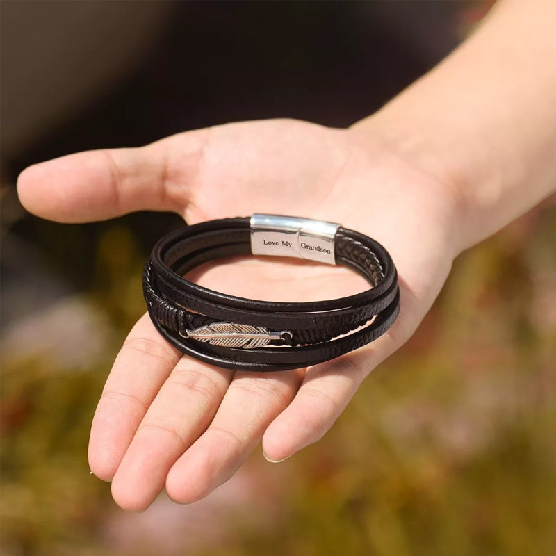 Armband mit Federmotiv und Stahl
