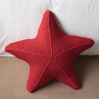 Handgestricktes Seestern-Kissen