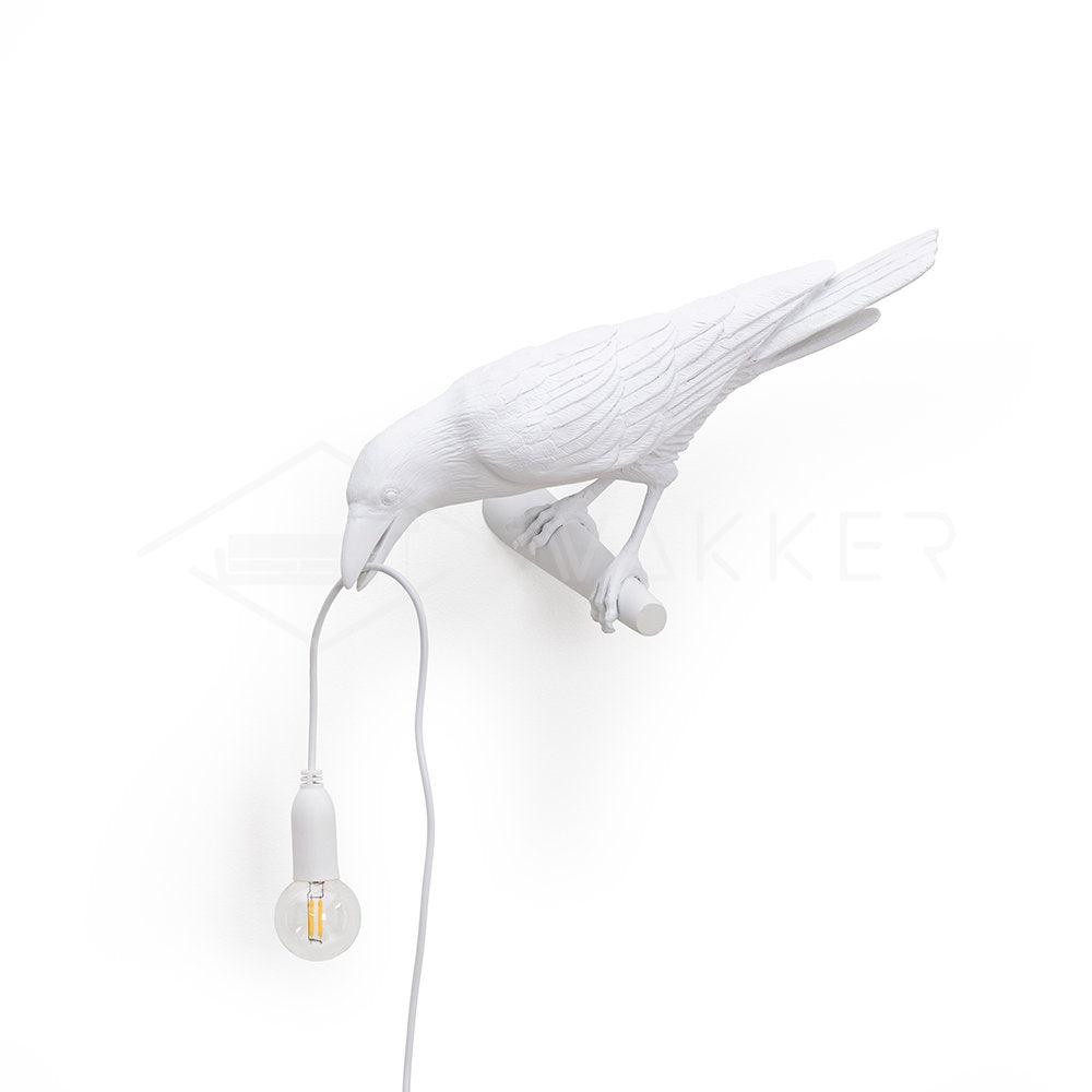 Wandlampe in Vogelform