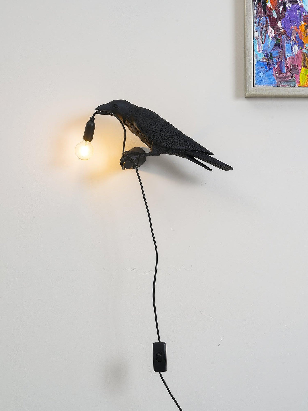 Wandlampe in Vogelform