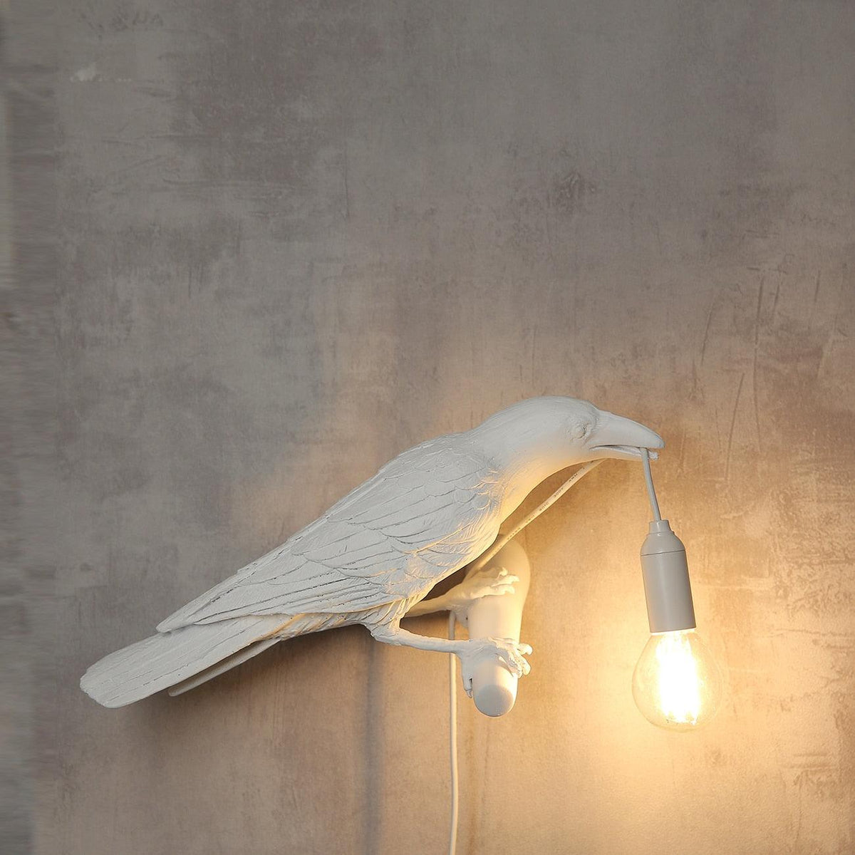 Wandlampe in Vogelform