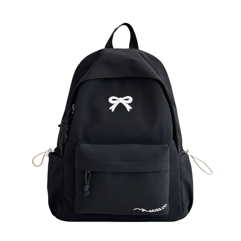 Lässige Schultasche mit Schleifenmuster