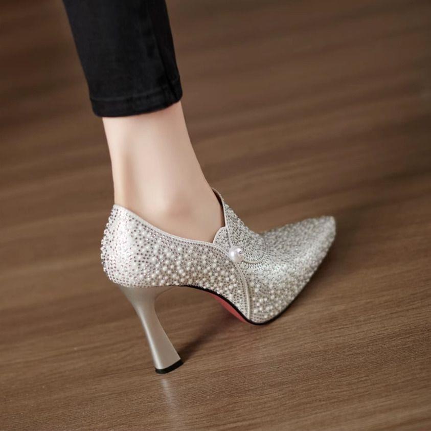 Damen-Stiefeletten mit spitzer Zehenpartie und hohem Absatz