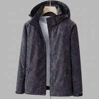 Wasserdichte Damenjacke mit Kapuze und Blattmuster
