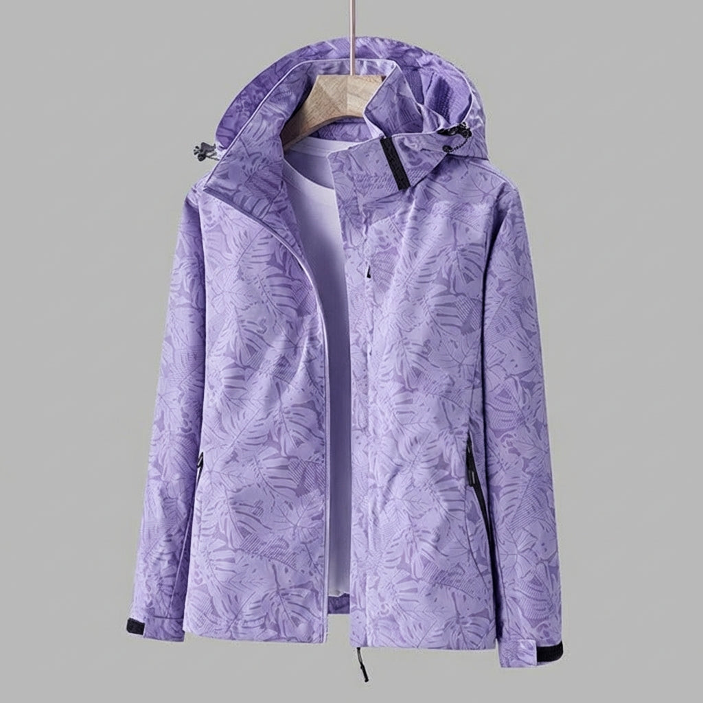 Wasserdichte Damenjacke mit Kapuze und Blattmuster