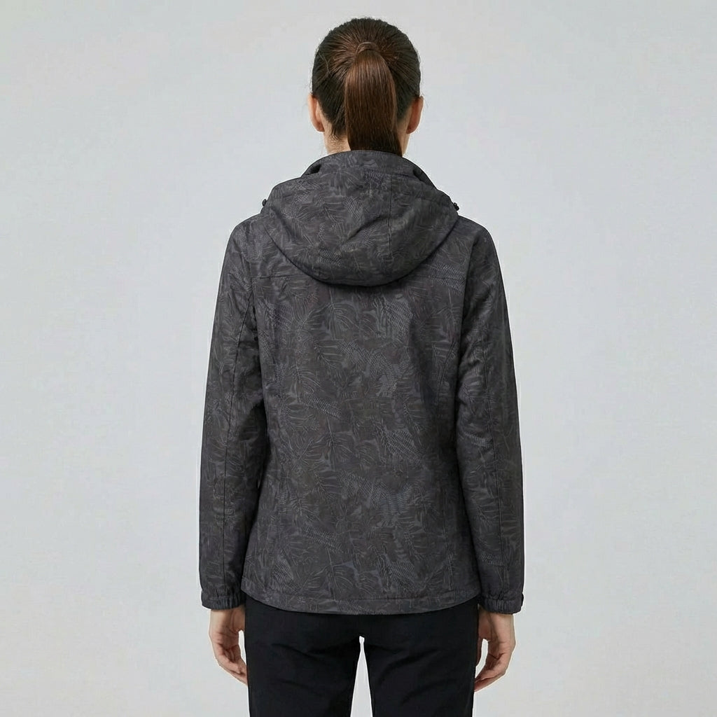 Wasserdichte Damenjacke mit Kapuze und Blattmuster