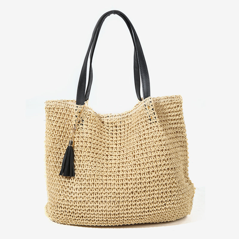 Handgefertigte geflochtene Damen-Schultertasche aus Naturmaterial mit eleganter Quastenverzierung