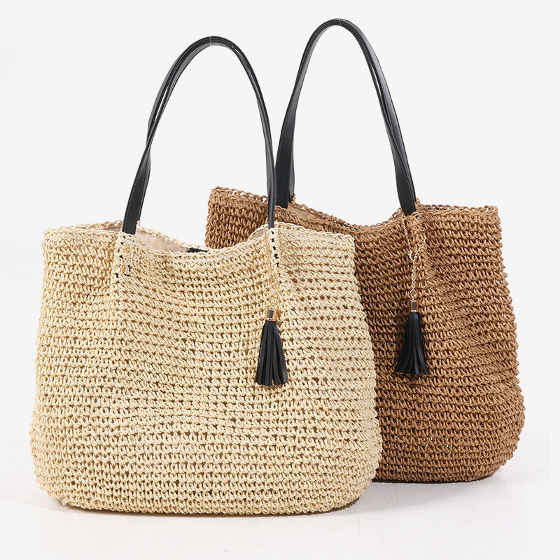Handgefertigte geflochtene Damen-Schultertasche aus Naturmaterial mit eleganter Quastenverzierung
