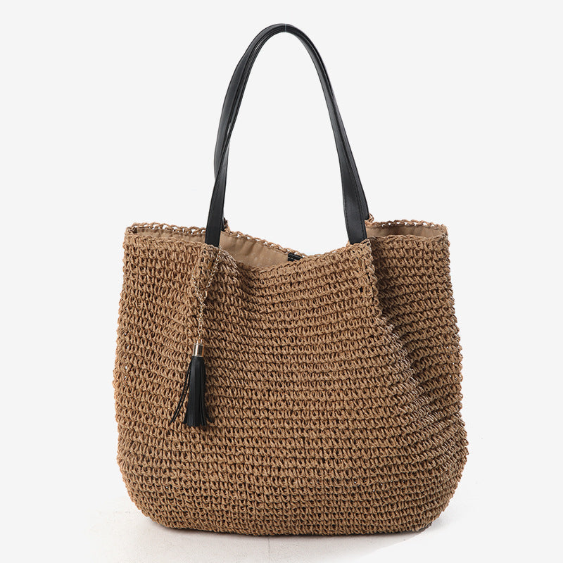 Handgefertigte geflochtene Damen-Schultertasche aus Naturmaterial mit eleganter Quastenverzierung