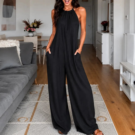 Neckholder-Jumpsuit mit weitem Bein, tiefen Taschen und fliessendem Fall