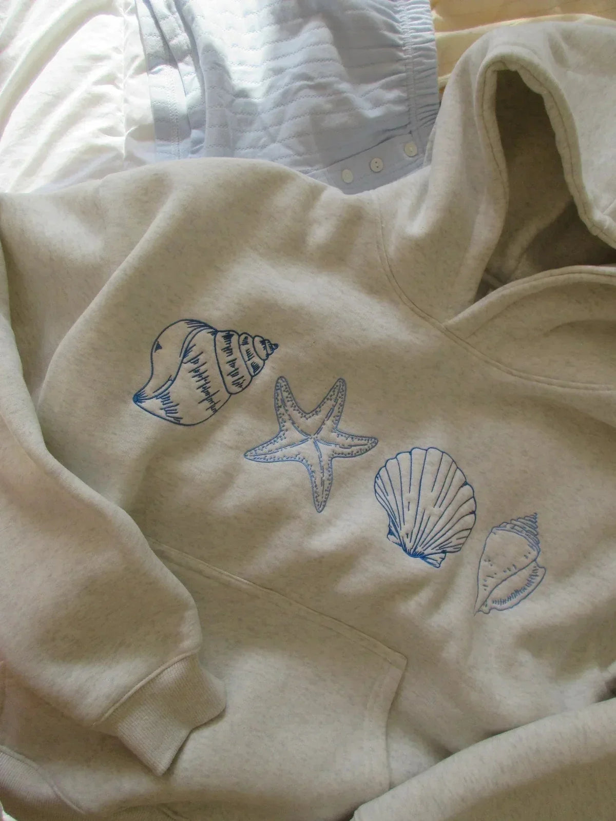 Unisex-Kapuzenpullover mit Strandmuster