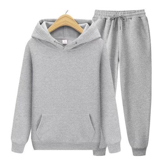 Unisex zweiteiliges Trainingsset mit Kapuzenpullover und Trainerhose aus weichem Material im lockeren Schnitt