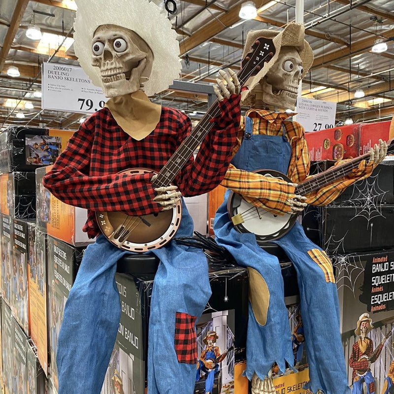 Lustige animierte duellierende Banjo-Skelette